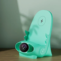 ForKumi 15W wireless charging phone holder in mint green with digital display and compact design