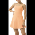 Avis women's active dress in peach with thin straps and a flared skirt perfect for active lifestyles